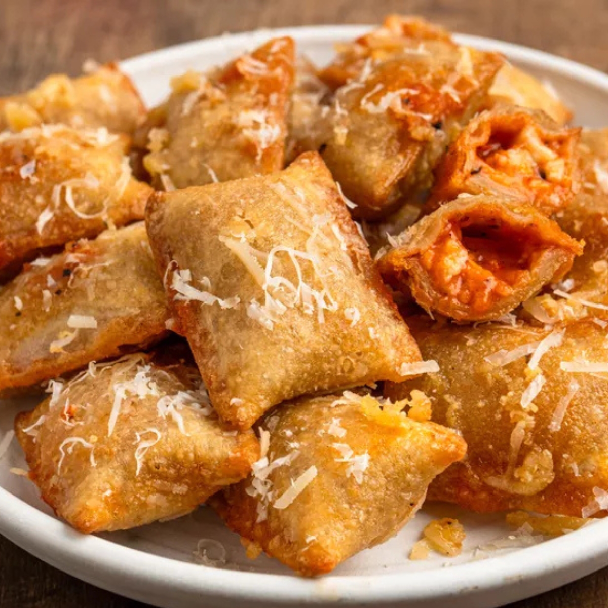 Parmesan Garlic Pizza Rolls Golden, crispy, and packed with flavor! These homemade Parmesan Garlic Pizza Rolls are the perfect bite-sized treat. With gooey cheese and a crispy exterior, they're irresistible on their own or paired with marinara for dipping.