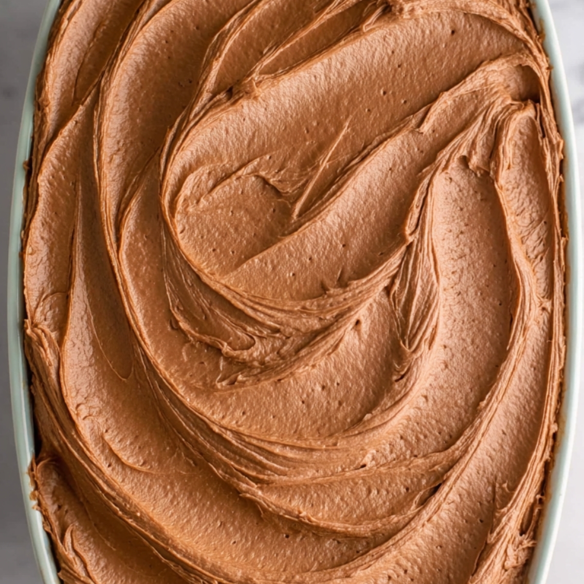 chocolate buttercream frosting, creamy frosting, homemade chocolate frosting, chocolate frosting recipe, frosting for cake, smooth frosting, easy frosting ideas, homemade cake frosting, chocolate cake decoration, cake frosting tutorial, rich chocolate buttercream, smooth chocolate topping.