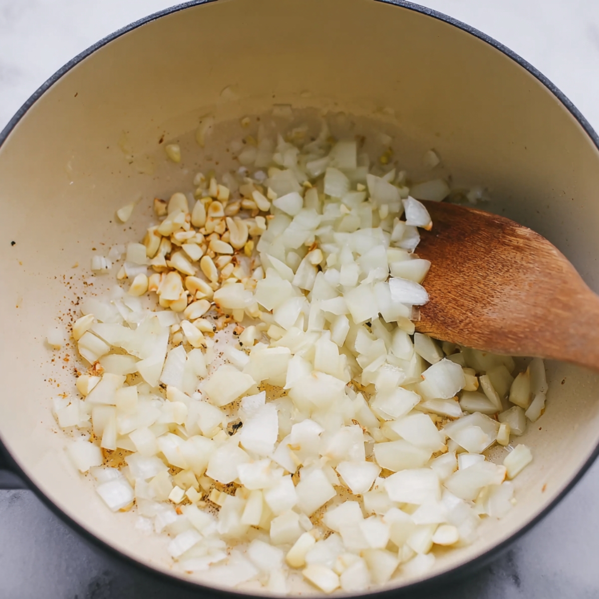 The secret to a perfect soup starts with sautรฉing onions and garlic in coconut oil! ๐ง๐ฅฅ The aroma is unbeatable! #CookingTips #SoupBase #FlavorBoost