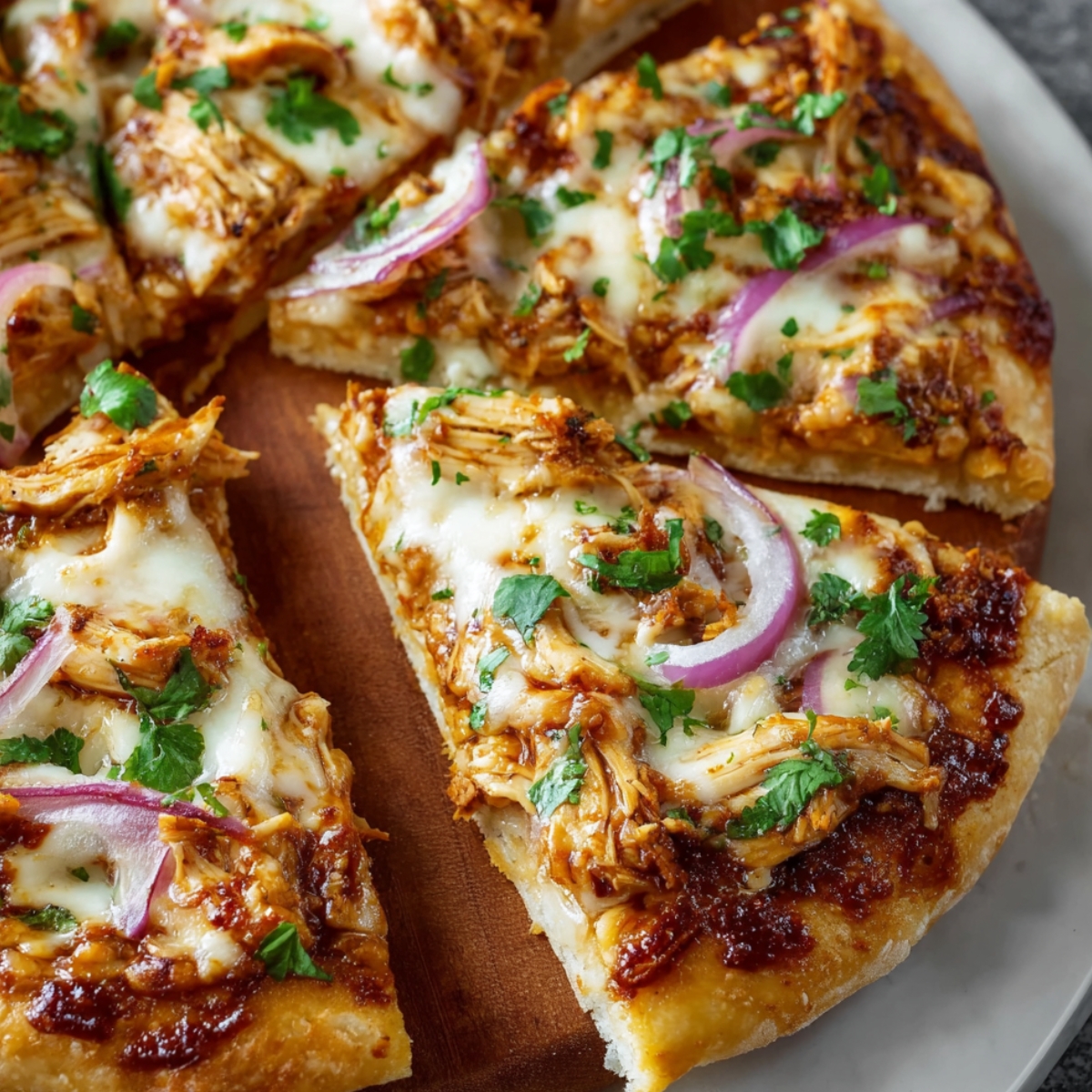 BBQ Chicken Pizza BBQ chicken pizza topped with fresh cilantro and red onions—an irresistible combo! 🍕 #BBQPizza #DeliciousEats